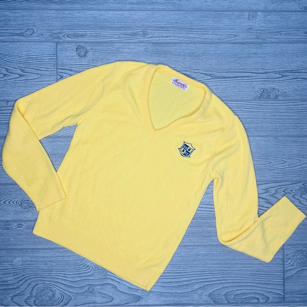 Vintage yellow haymaker sweater with crest emblem no tag around a small / medium